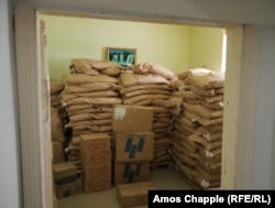 Piles of food supplies, including baby formula, is seen in storage after it was blocked from being sent to Nagorno-Karabakh in February.