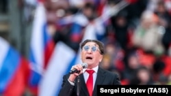 Russian singer Grigory Leps performs at an open-air concert and rally titled Glory to Defenders of Our Fatherland in Moscow’s Luzhniki Stadium on February 22.