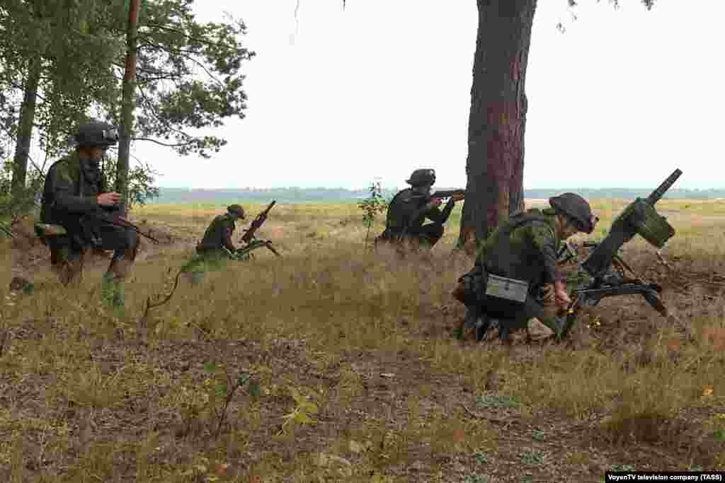 The images show Belarusian troops, including these soldiers operating automatic grenade launchers, being trained by Wagner mercenaries &quot;less than 5 kilometers&quot; from the Polish border, according to the Belarusian Defense Ministry.&nbsp;