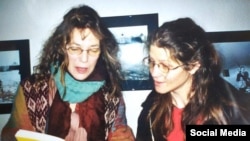 Jane Birkin (left) with Aude Merlin, a social-sciences professor at the Free University of Brussels