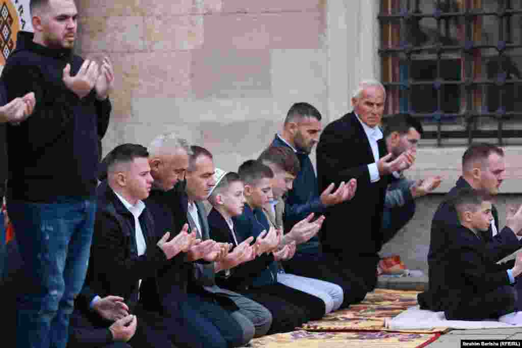 Kosovar Muslims pray on the first day of Eid al-Fitr at the Grand Mosque in Pristina.