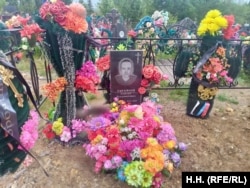 The grave in Domna of Wagner fighter Aleksei Lukyanov, who was killed near the eastern Ukrainian city of Bakhmut.