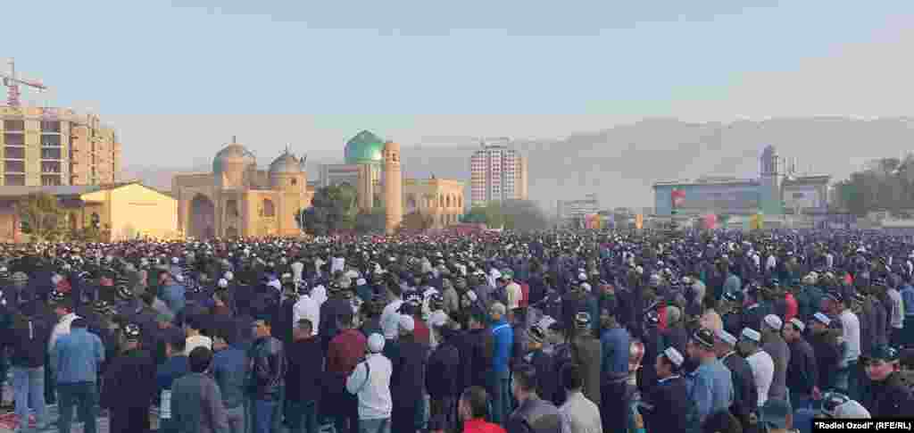 Eid al-Fitr prayers take place outside the central mosque in Khujand, Sughd region, Tajikistan.