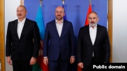 EU Council President Charles Michel (center) met with Azerbaijani President Ilham Aliyev (left) and Armenian Prime Minister Nikol Pashinian for EU-sponsored talks in Brussels on July 15.