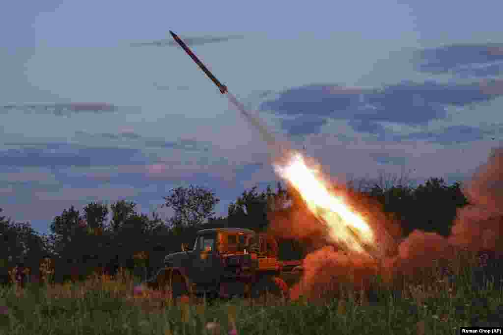 A Ukrainian artillery crew fires a Grad multiple rocket launcher toward Russian positions near Bakhmut on July 12. Serhiy Cherevatiy, spokesman for the eastern military command, said Ukraine had enjoyed &quot;partial success&quot; on the southern flanks of the shattered eastern city&nbsp;Bakhmut&nbsp;and that Ukrainian troops held the strategic initiative there.