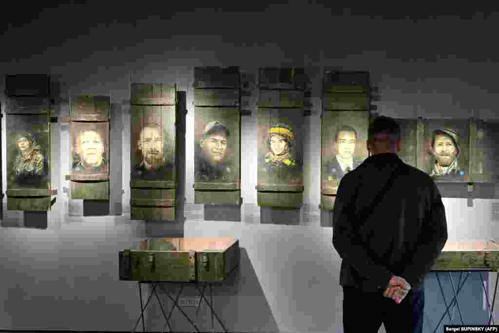 The exhibition includes video, installation, wall paintings, personal items of fallen soldiers, and their portraits, which were created over 18 months while the artist worked in Ukraine.