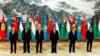 Chinese leader Xi Jinping (3rd from right) welcomes Uzbek President Shavkat Mirziyoev (left to right), Tajik President Emomali Rahmon, Kazakh President Qasym-Zhomart Toqaev, Kyrgyz President Sadyr Japarov, and Turkmen President Serdar Berdymukhammedov at the China-Central Asia Summit in Xian on May 19.