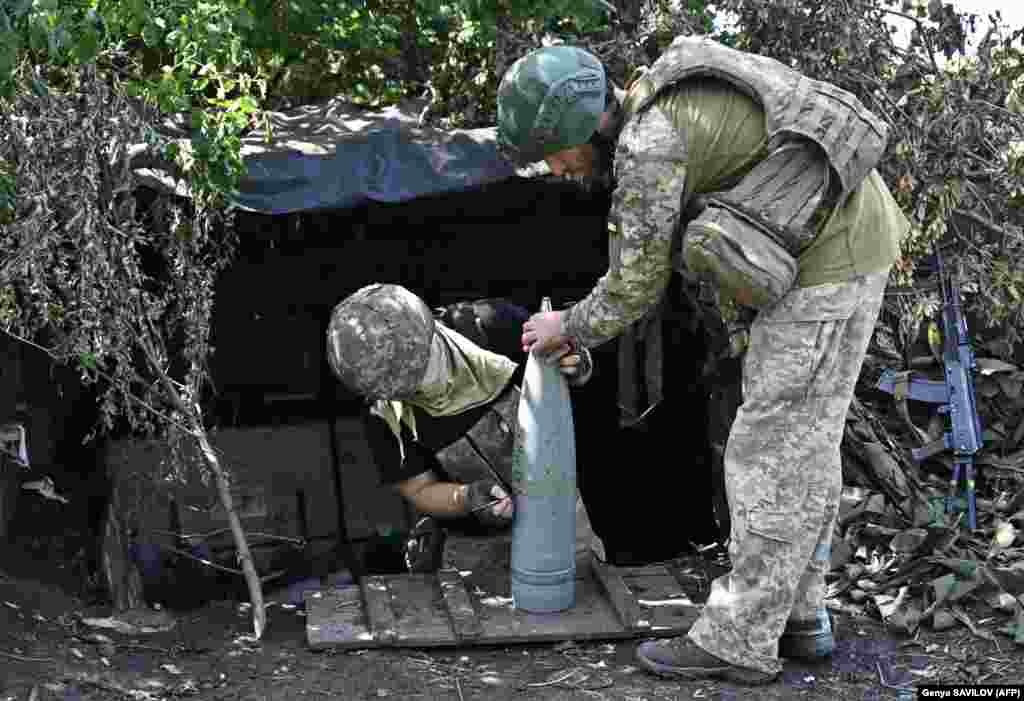 Ukrainian artillerymen prepare shells near Bakhmut. The counteroffensive comes after months of preparation and resupply, with as many as nine newly constituted, NATO-trained armored brigades. &nbsp;