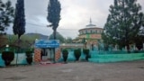 The Mai Toti shrine in the Pakistani village of Bandli, where worried residents have been gathering to pray for 28 local men who were lost when a boat capsized in the Mediterranean on June 14, leaving hundreds missing, feared dead. 