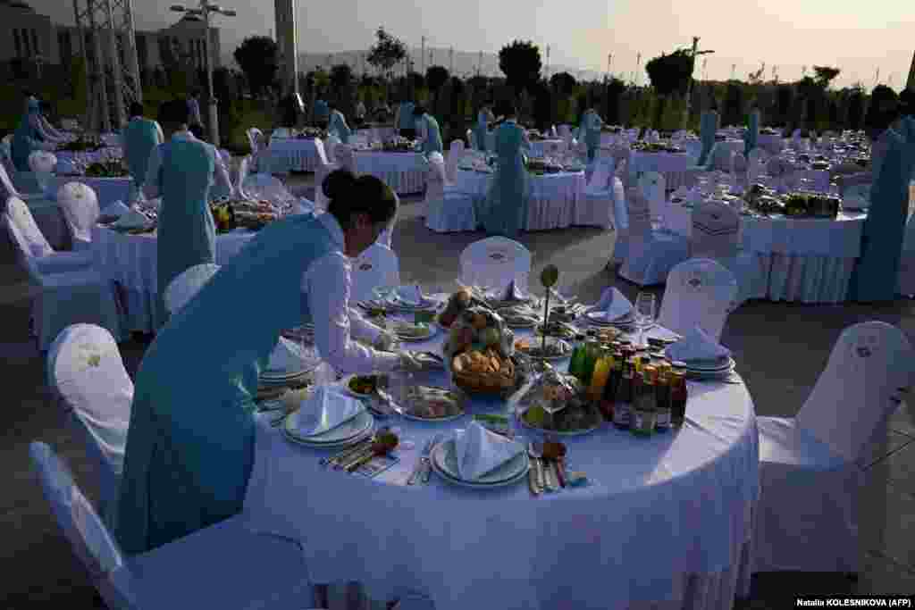 Smartly dressed servers prepare the dinner tables for the guests. Since independence from the Soviet Union in 1991, Turkmenistan has been led by authoritarian regimes that allow no significant opposition and has sharply limited access from abroad.&nbsp; &nbsp;