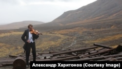 In 2016, a cultural performance dedicated to those who worked and died in the camps was staged. Here, a lone violinist, played by actor Sergei Nazimov, performs at the site of a camp where tuberculosis patients were taken to recover. Many of them died.