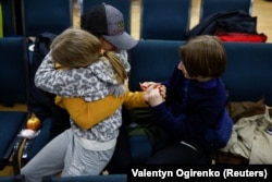 Anastasia is reunited with her daughter, Valeria, and son, Maksym, in Kyiv on April 8. Her two children went to a Russian-organized summer camp from nongovernment-controlled territories and were then taken to Russia.