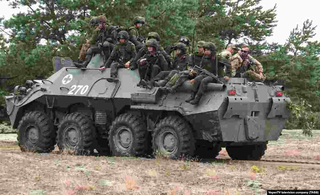 Belarusian soldiers and Wagner fighters on an armored vehicle at a training ground in Belarus&#39;s Brest region.&nbsp; In a post on the Belarus Defense Ministry&#39;s Telegram&nbsp; channel, a soldier was quoted as saying that Wagner fighters, &quot;constantly show us new tricks and share their experiences from combat operations. There isn&#39;t much time for rest but this experience is very cool and we need it,&quot; the unnamed soldier said.&nbsp;