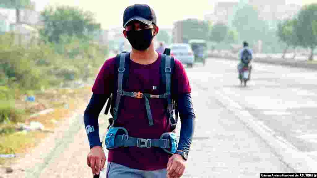 Arshad walks along a road in Pakistan. &quot;I have always loved walking. I previously completed 1,270 kilometers on foot in&nbsp;Pakistan, which gave me full confidence in myself that I am able to complete this journey. Of course, there were some obstacles, such as bad weather, blisters on my feet due to walking.&quot;