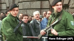 Police guard the entrance of the Berlin court in the district of Moabit in April 1997. The court convicted an Iranian and three Lebanese men in the 1992 murder of four Kurdish Iranian opposition politicians in the Mykonos restaurant.