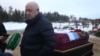 Wagner founder Yevgeny Prigozhin attends the funeral of one of his fighters in December.