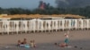 Smoke and flames rise after explosions at a Russian military airbase in Novofedorivka, Crimea, in August.