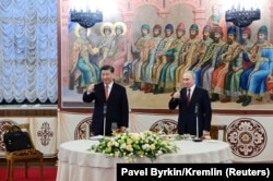 Xi Jinping and Vladimir Putin share a toast on March 21 during the Chinese leader's three-day visit to Moscow.