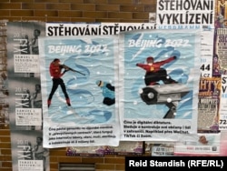Posters from Badiucao’s guerrilla art campaign about the 2022 Beijing Winter Olympics, along with captions about human rights abuses in China, seen on the streets of Prague in February 2022.